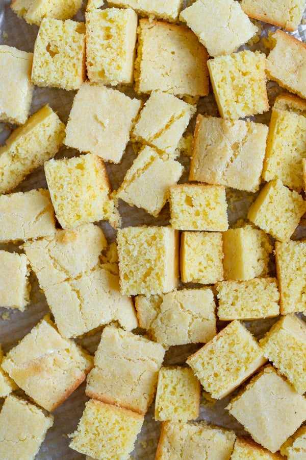 cornbread on a baking sheet cut into cubes 