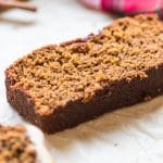 a slice of gingerbread on parchment paper