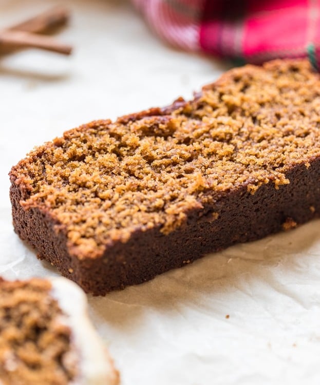 a slice of gingerbread on parchment paper
