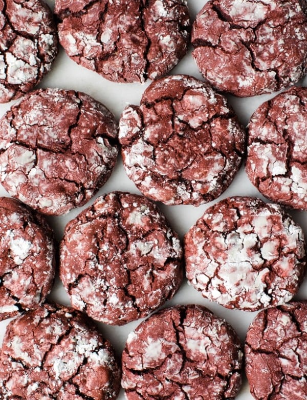red velvet crinkle cookies on a marble board