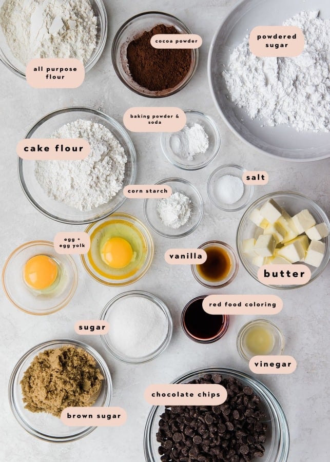 ingredients in glass bowls needed to make red velvet cookies
