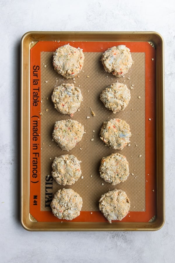 crab cakes on a baking sheet 