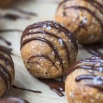 energy balls drizzled with chocolate and flaky sea salt