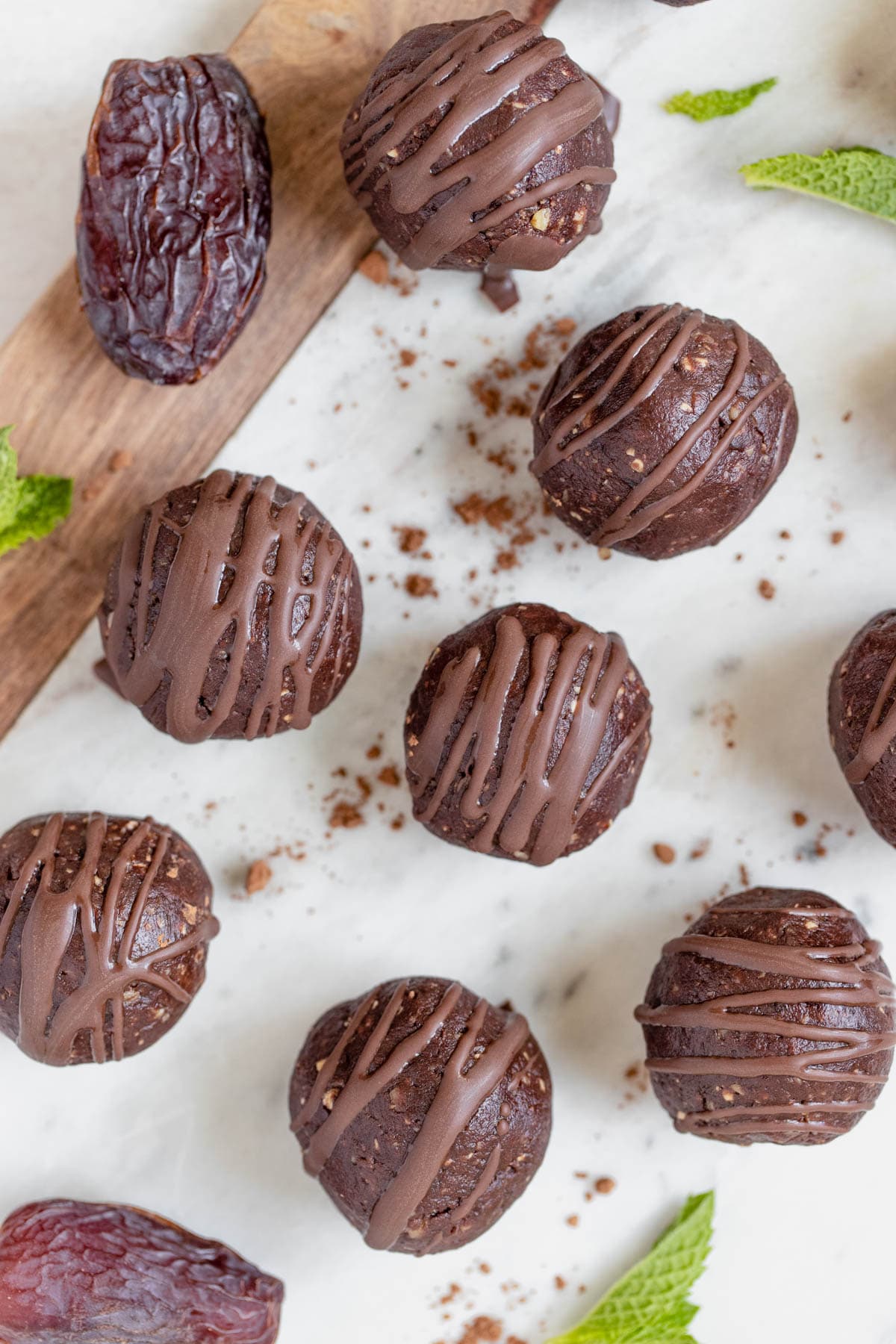 mint chocolate energy bites on a marble slab