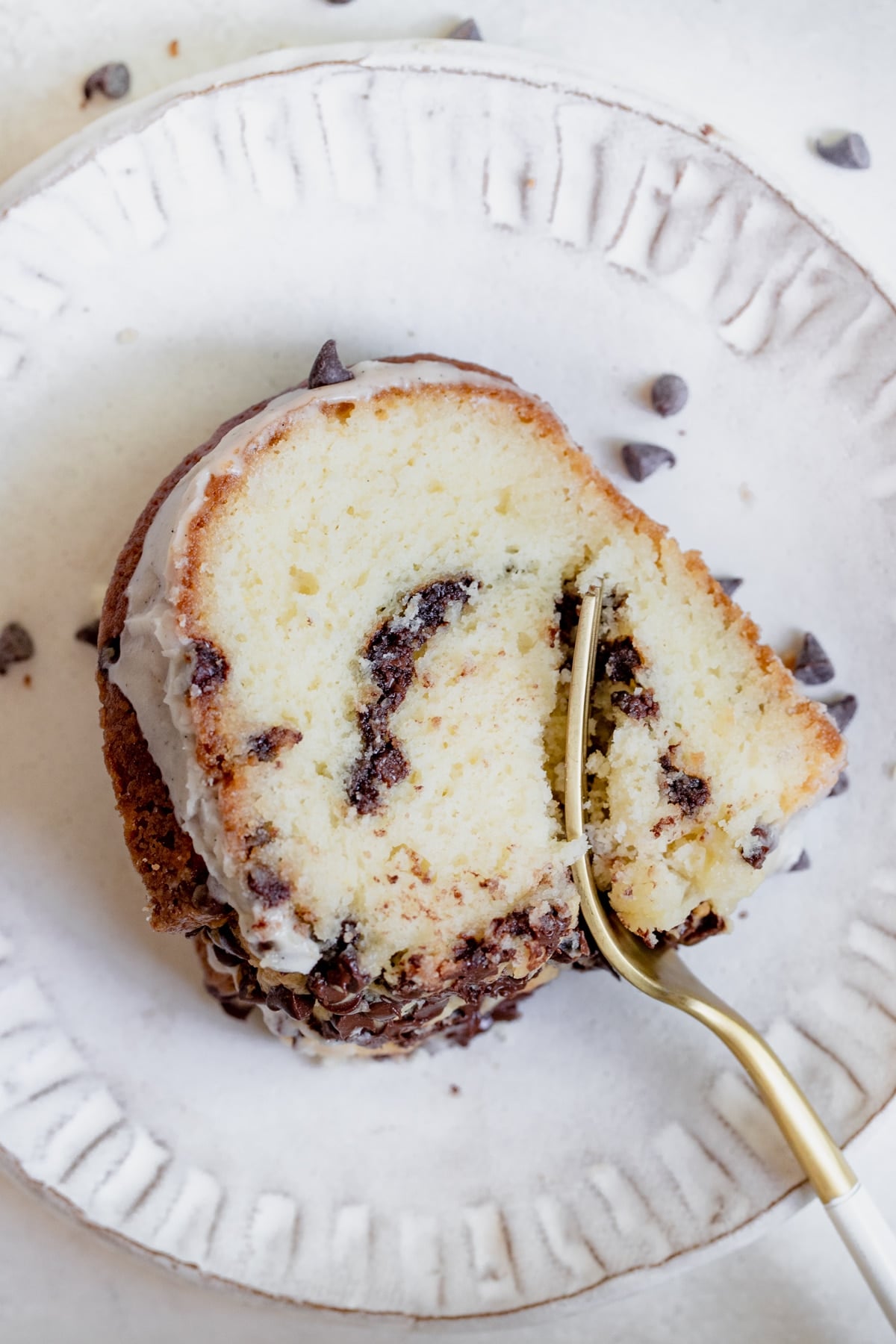 chocolate chip cake on a white plate
