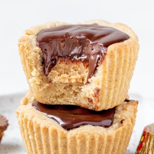 peanut butter cup cookies stacked on top of each other
