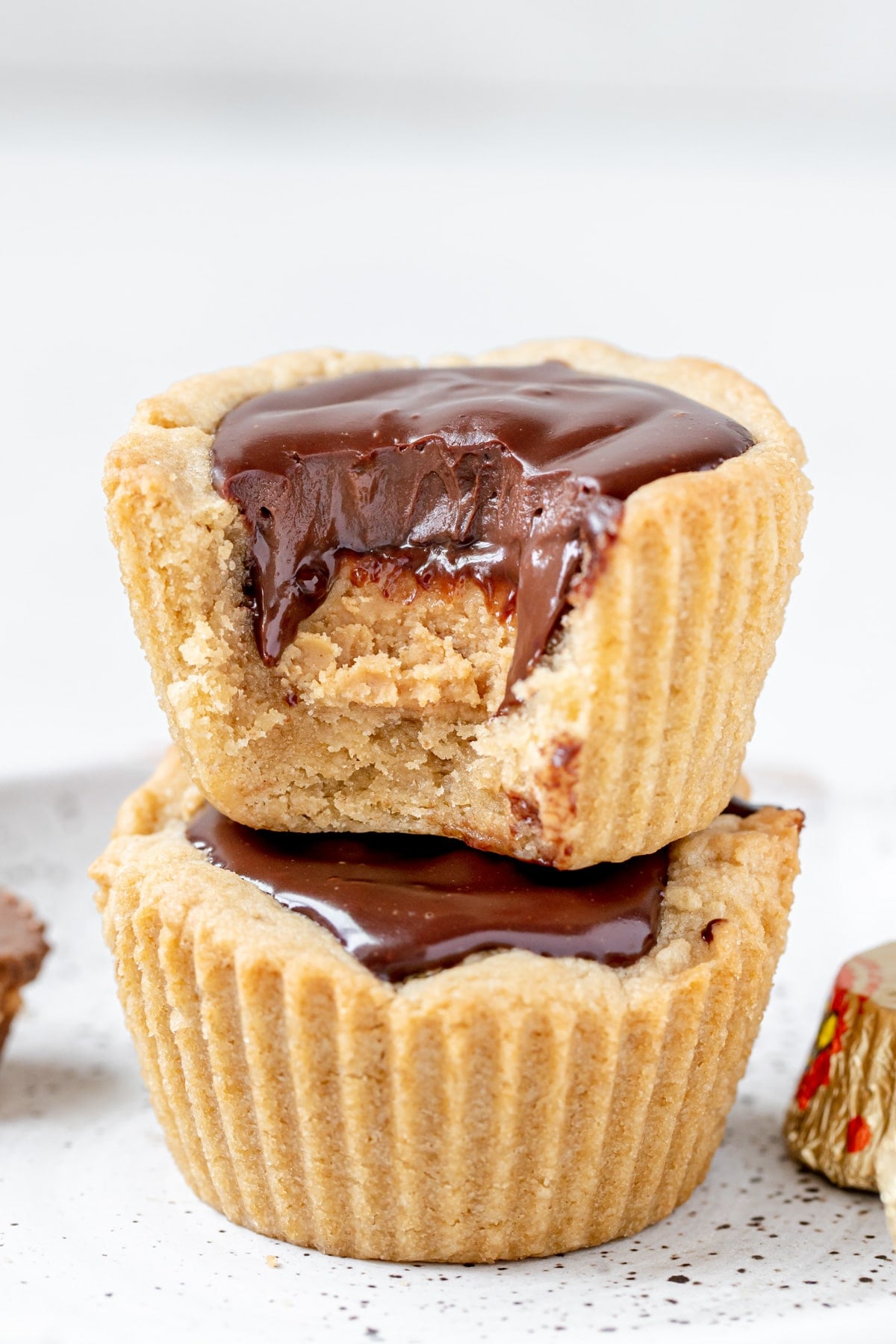 peanut butter cup cookies stacked on top of each other