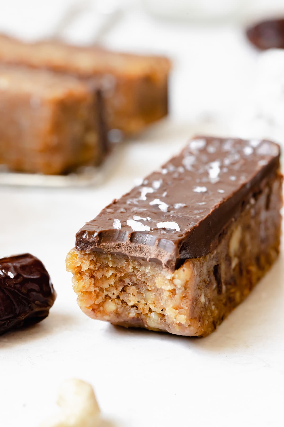 a photo of a bite taken out of a protein bar