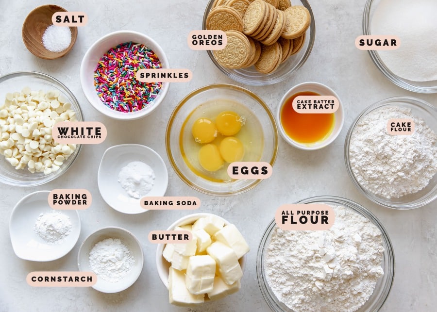 ingredients needed to make cookie bars in small glass bowls and dishes