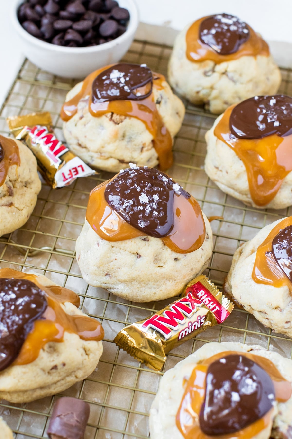 cookies topped with chocolate, caramel and sea salt
