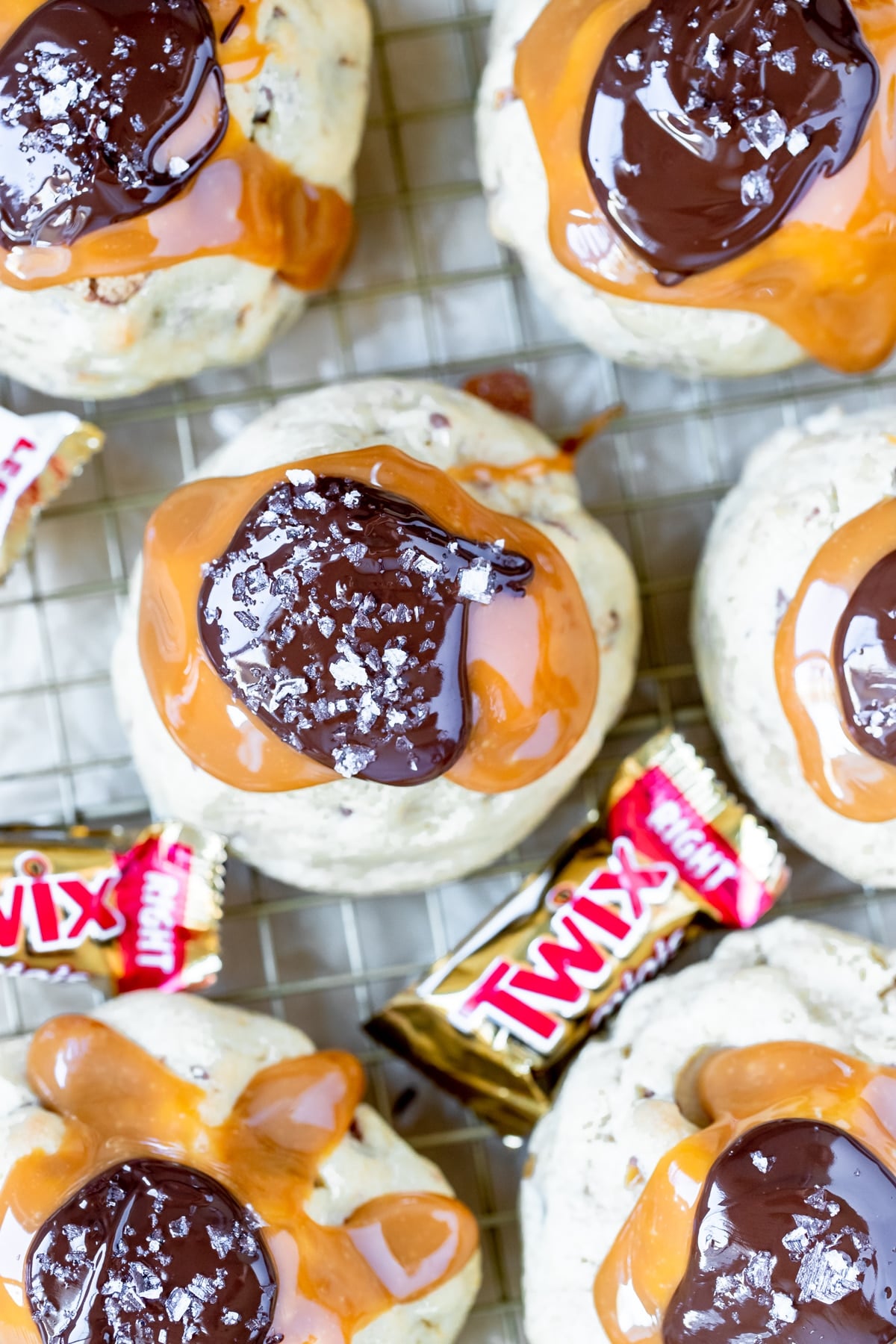 cookies topped with chocolate, caramel and sea salt