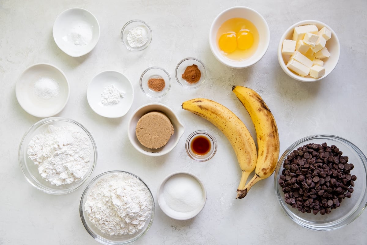 ingredients to make cookies in small glass bowls