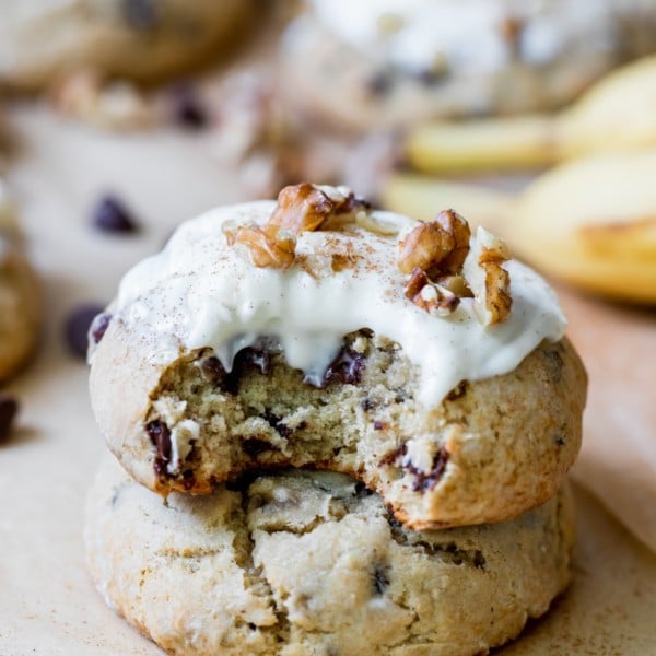 cookies stacked on top of each other with cream cheese frosting