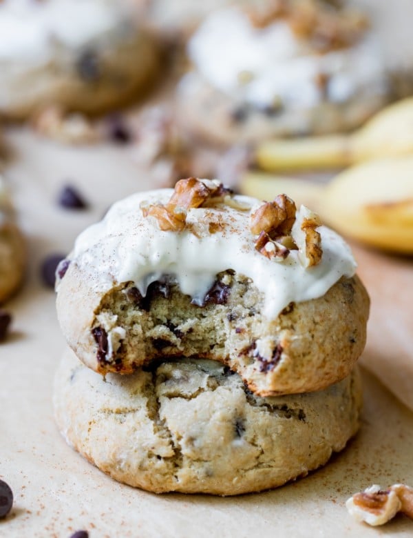 cookies stacked on top of each other with cream cheese frosting