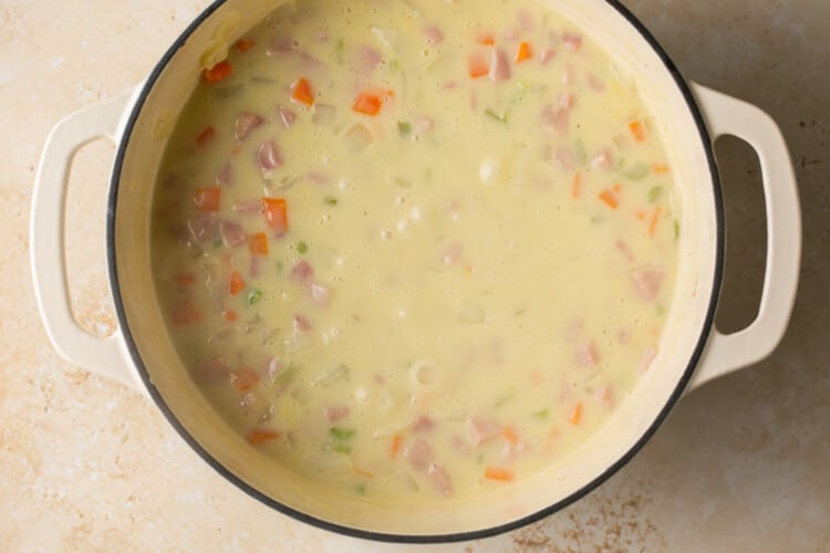 broth with veggies and chopped ham
