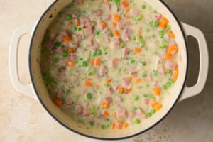 broth with veggies and chopped ham