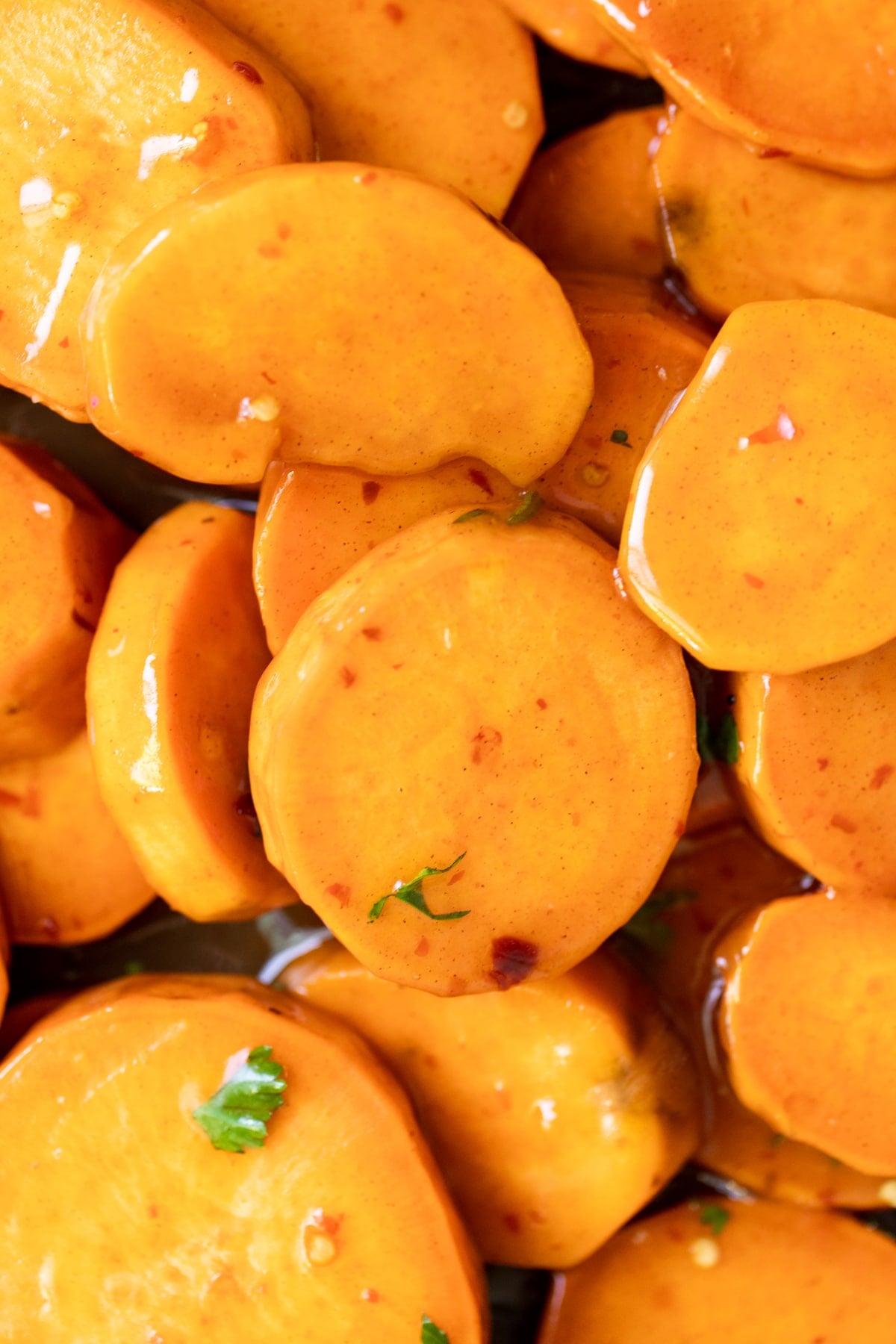 sweet potatoes covered in honey and chili flakes