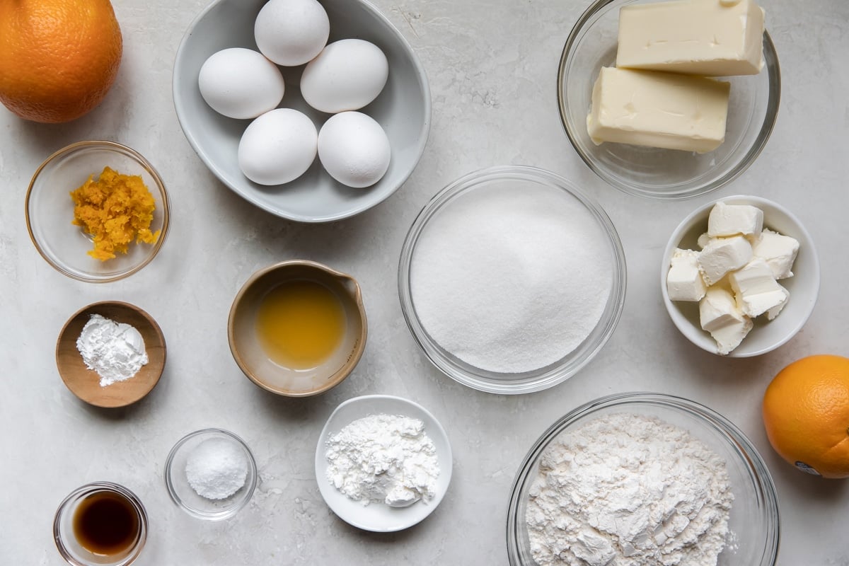 all of the ingredients needed to make a pound cake in glass bowls 