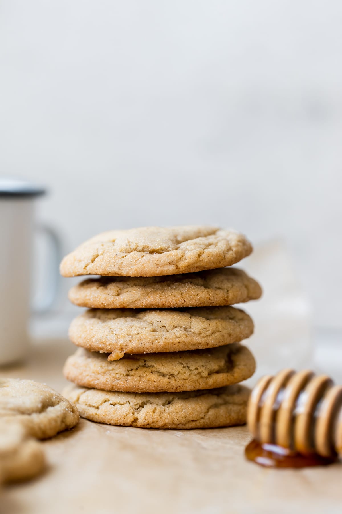 a stack of cookies on parchment paper