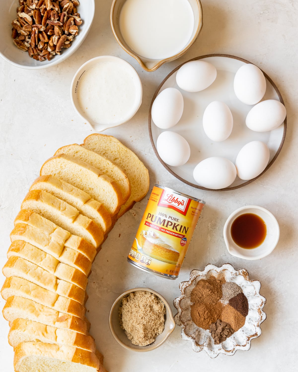 ingredients to make french toast in small bowls.