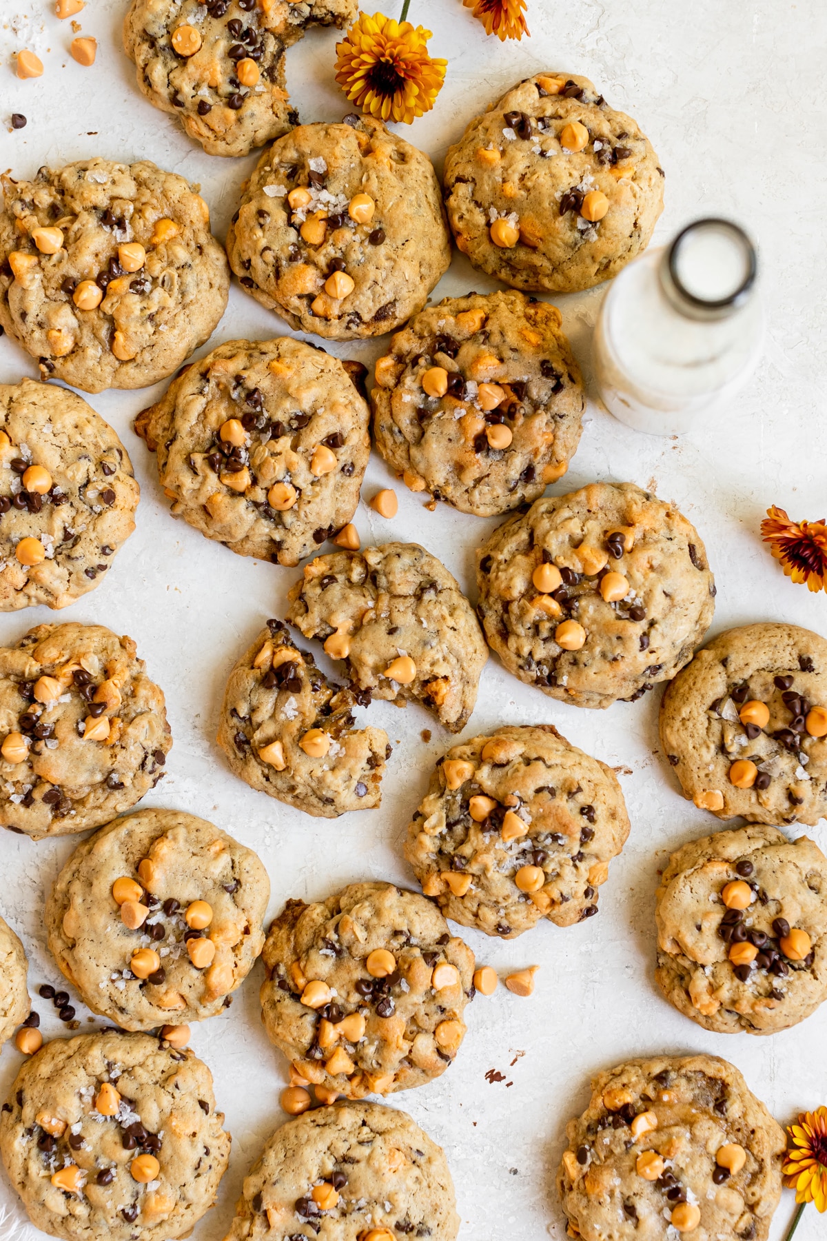 freshly baked cookies made with butterscotch chocolate chips, mini chocolate chips and garnished with sea salt on top. 