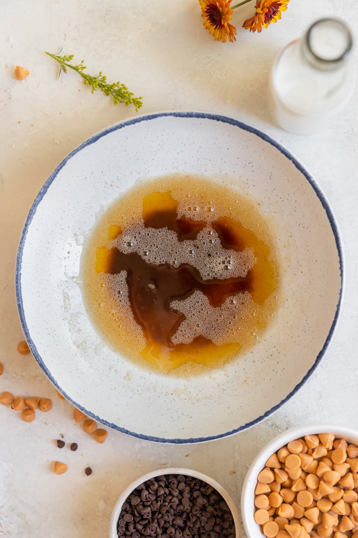 brown butter in a white and blue bowl.
