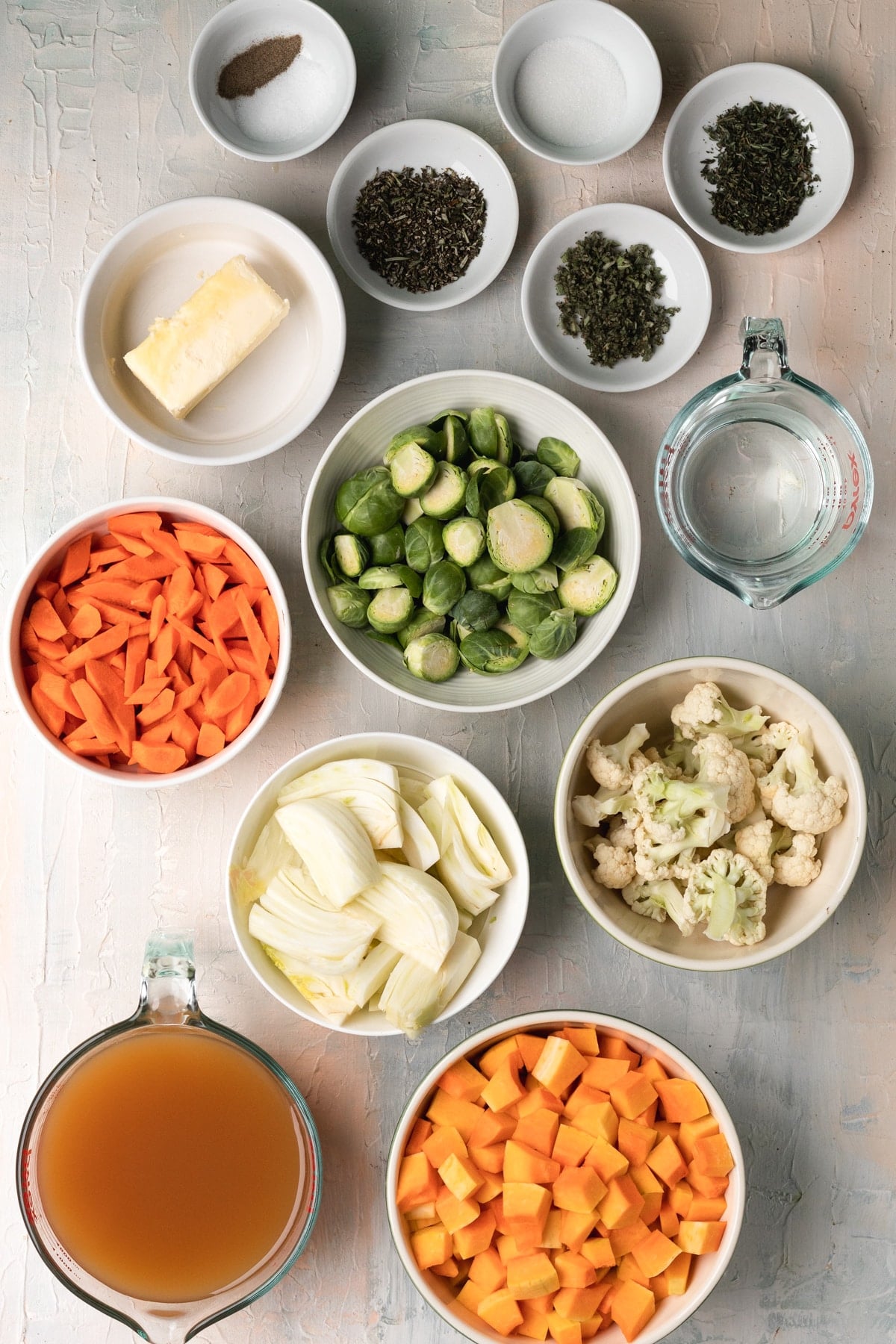 veggies in white bowls.