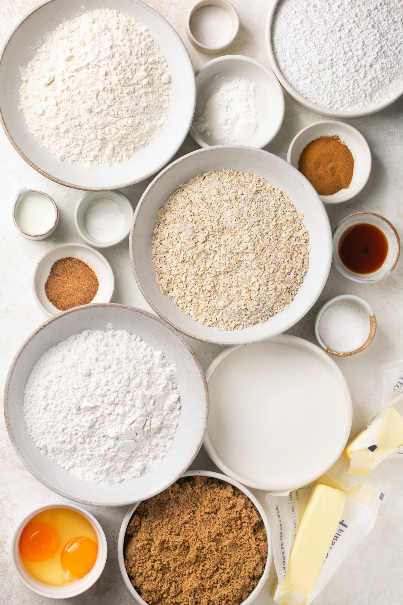 ingredients in glass bowls needed to make cookies. 