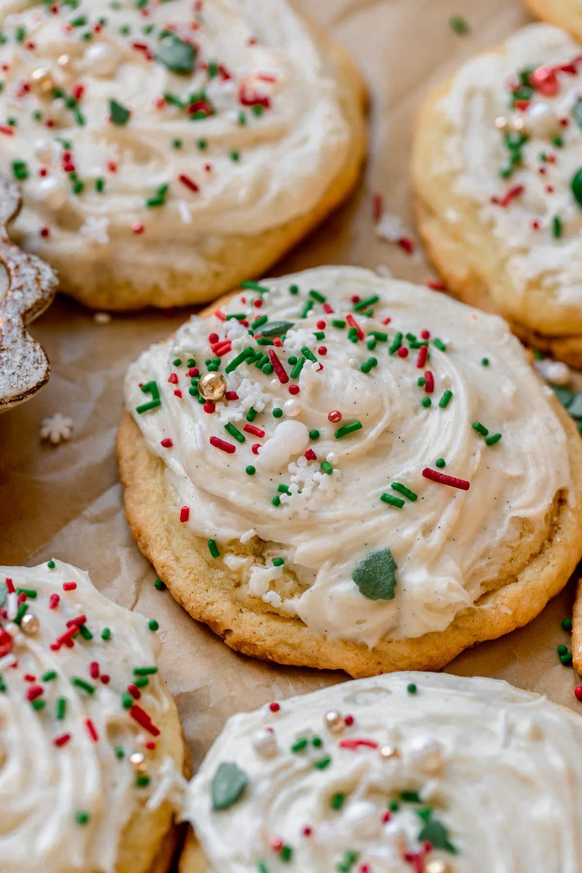 cookies with frosting and sprinkles on top. 