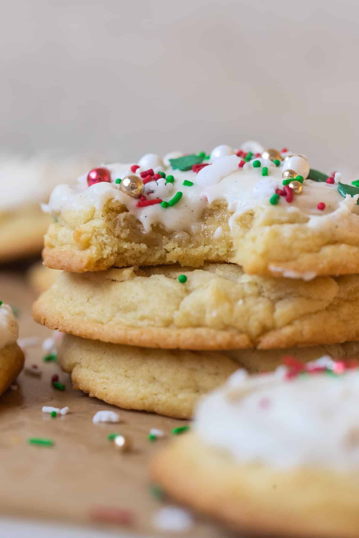 cookies stacked on top of each other with a bite taken out of one cookie. 