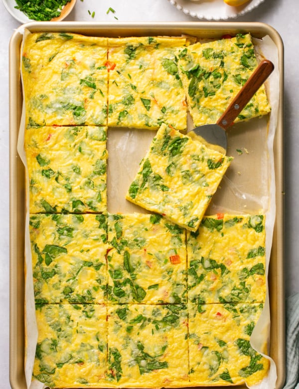 sheet pan with cooked eggs sliced into squares