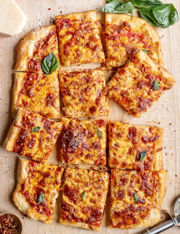 rectangle cheese pizza cut into squares