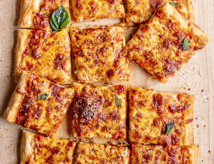 rectangle cheese pizza cut into squares