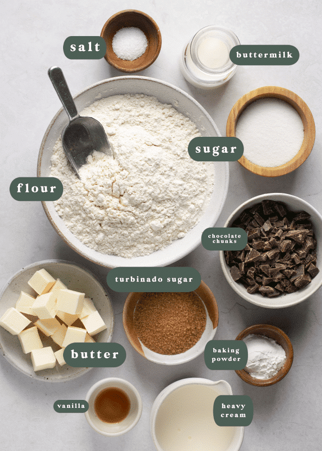 ingredients in small glass bowls needed to make scones.
