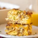 two slices of egg casserole on a white plate