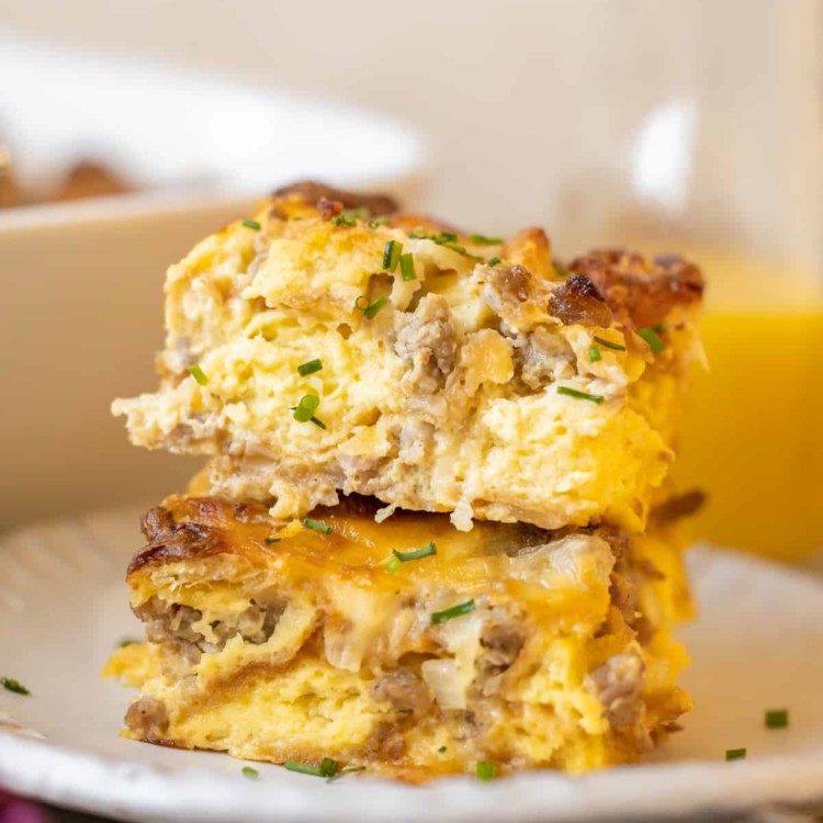 two slices of egg casserole on a white plate