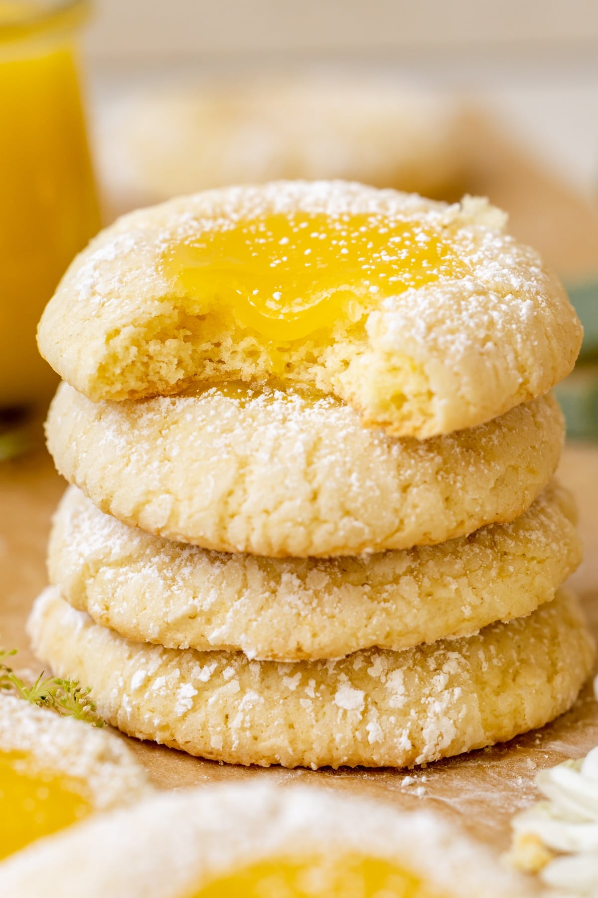 a bite taken out of a lemon curd cookie. 
