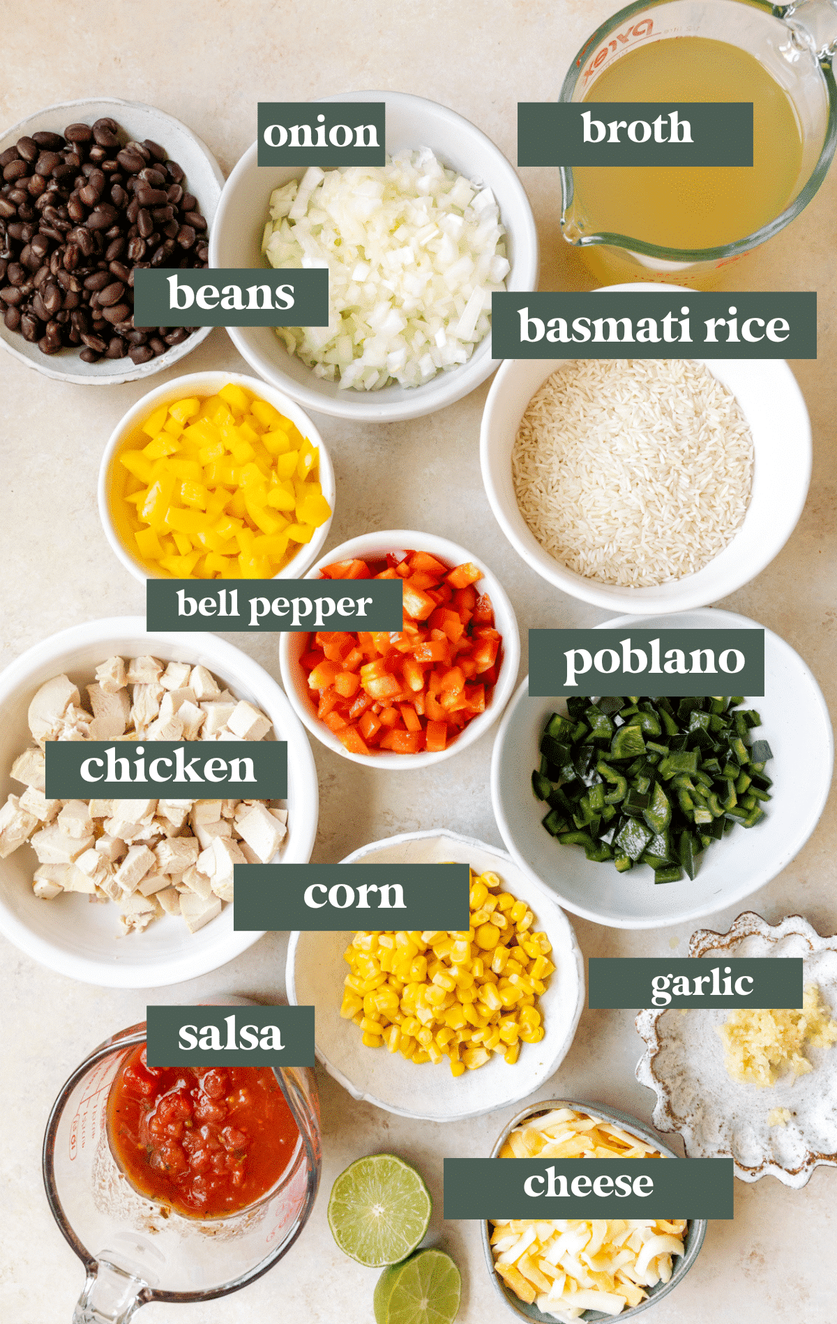 ingredients in white glass bowls needed to make chicken rice bowls.