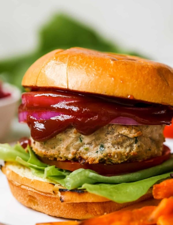 burger with lettuce and deep red pomegranate ketchup