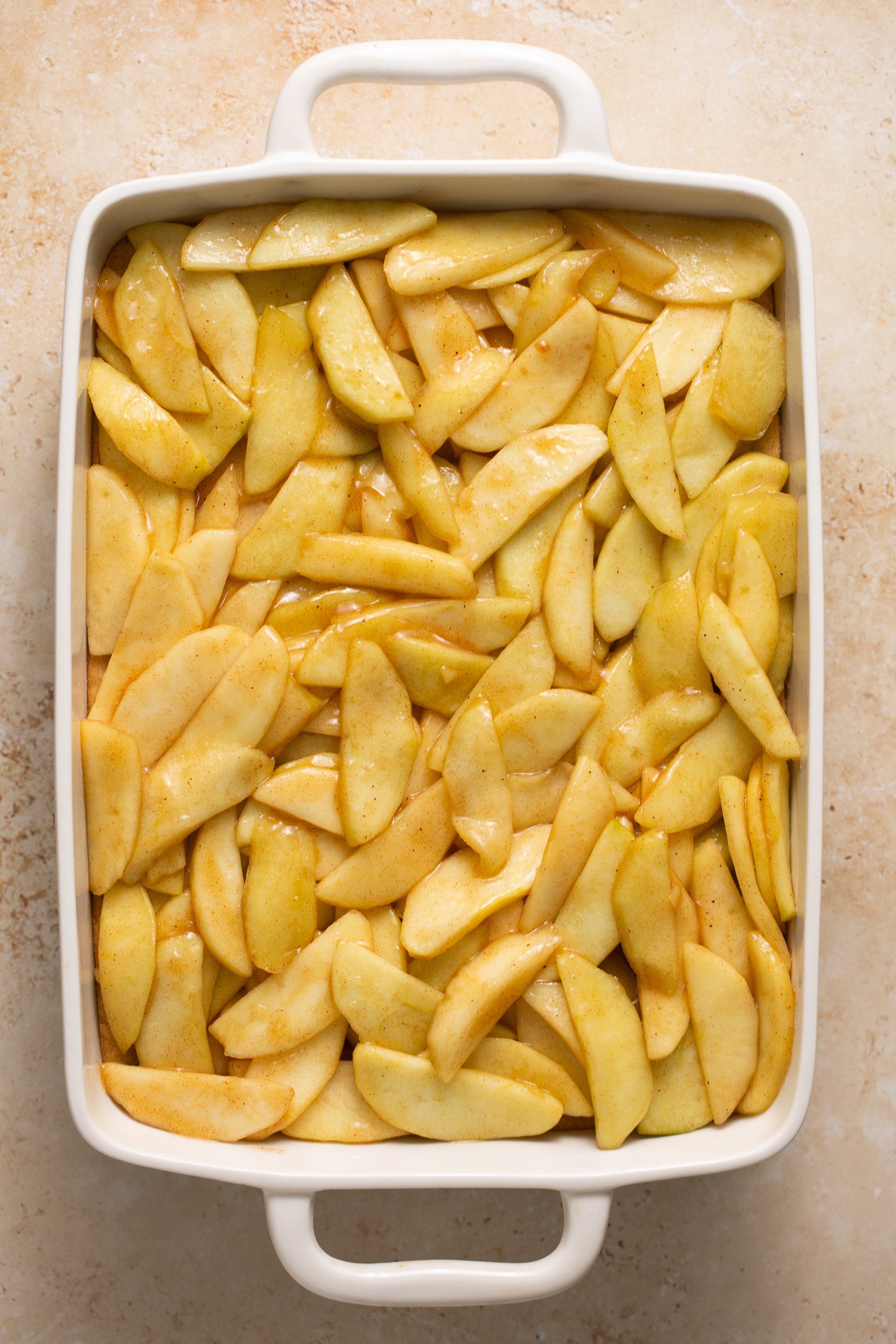 Apples in a ceramic baking dish. 