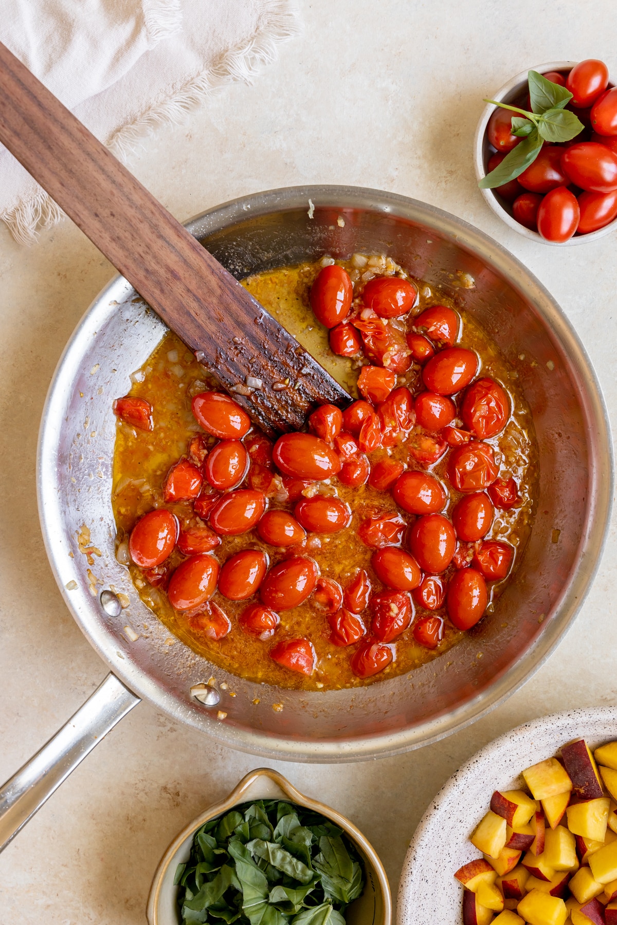 cherry tomatoes in a saute pan. 