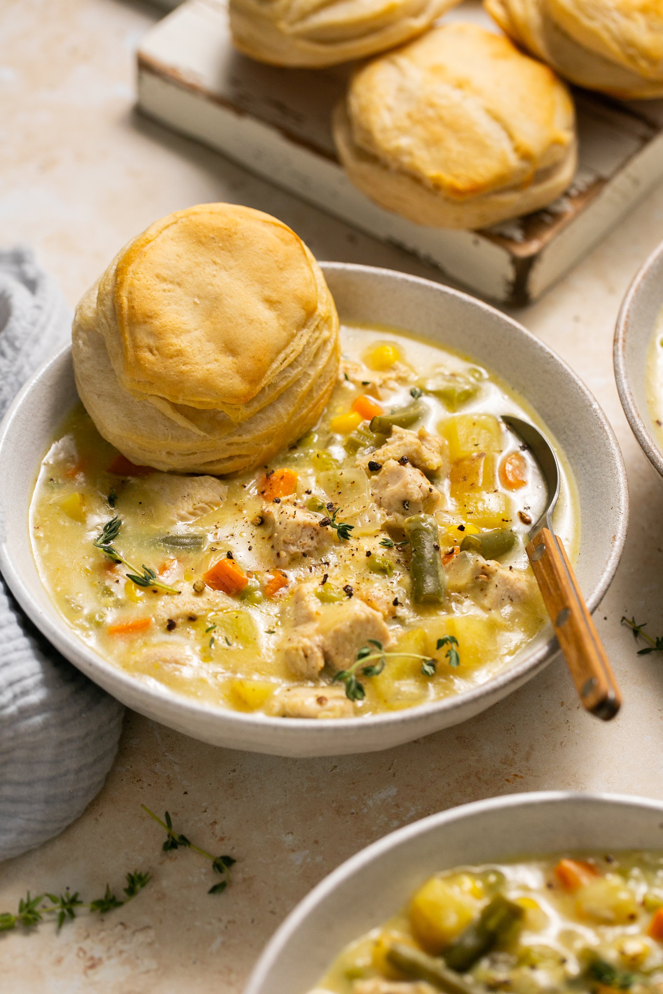 soup in a bowl with black pepper on top.