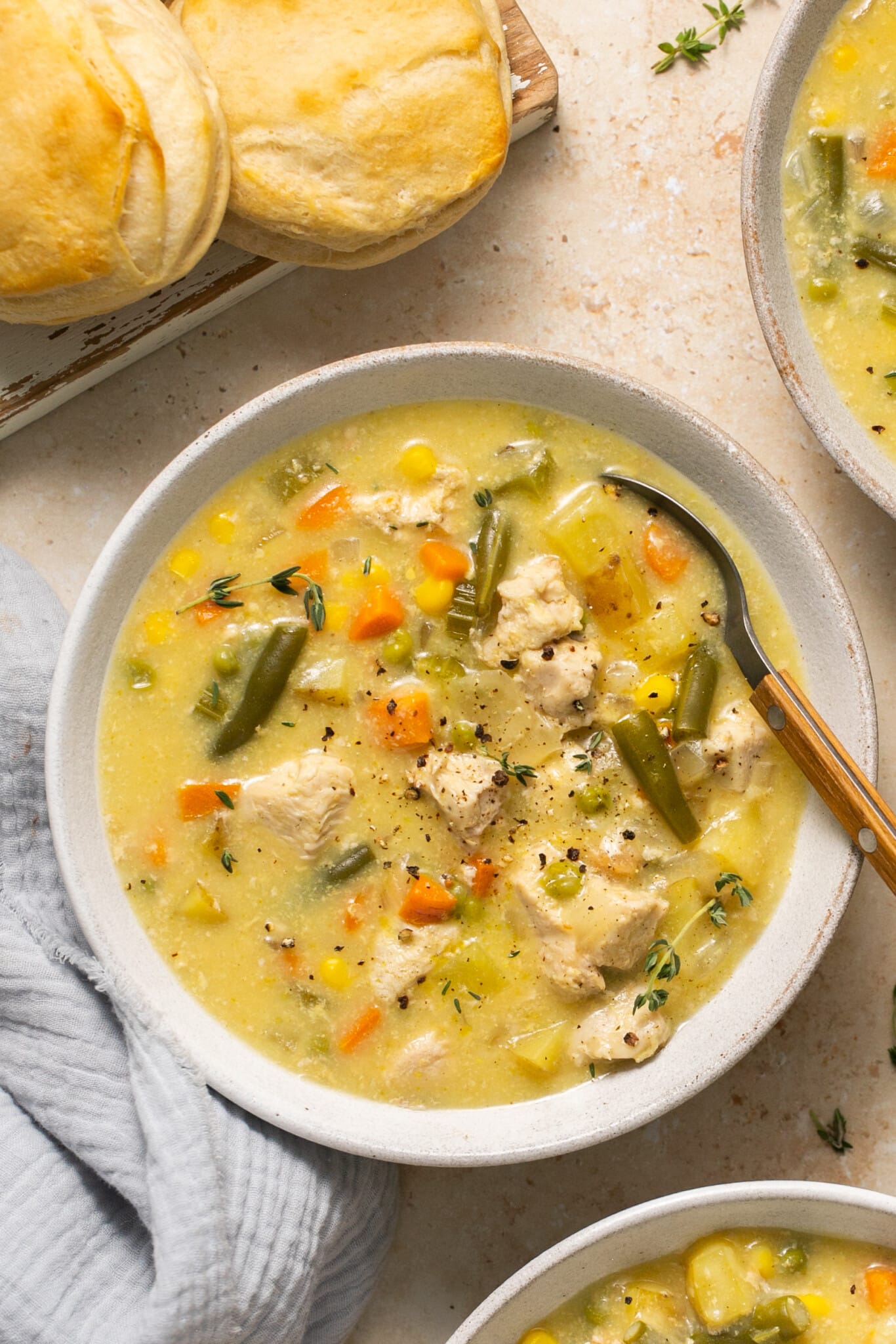 soup in a bowl with black pepper on top.