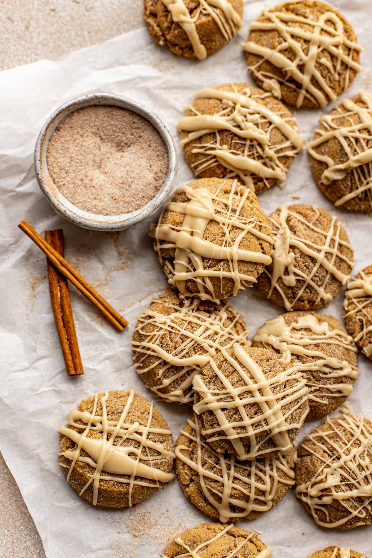 cookies on parchment paper with a maple glaze on top. 