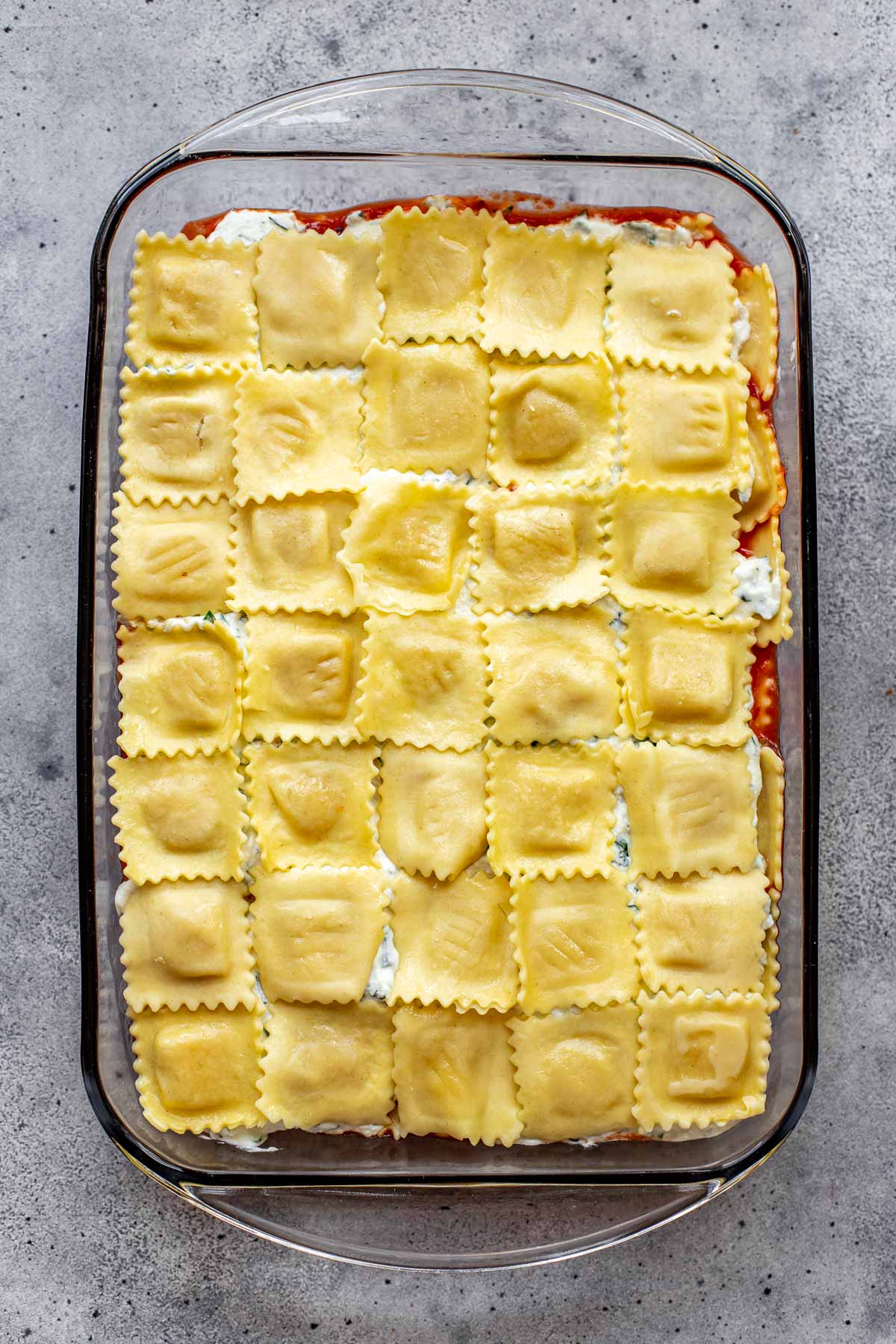 Ravioli in a glass baking dish. 