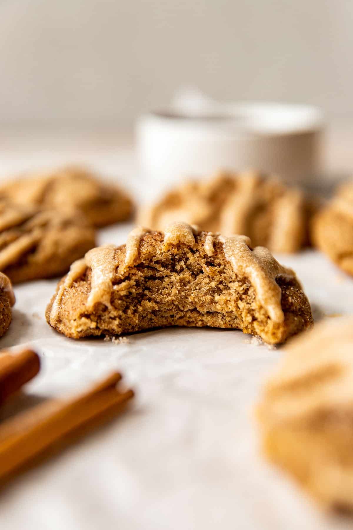 an apple butter cookie with a bite taken out of it. 