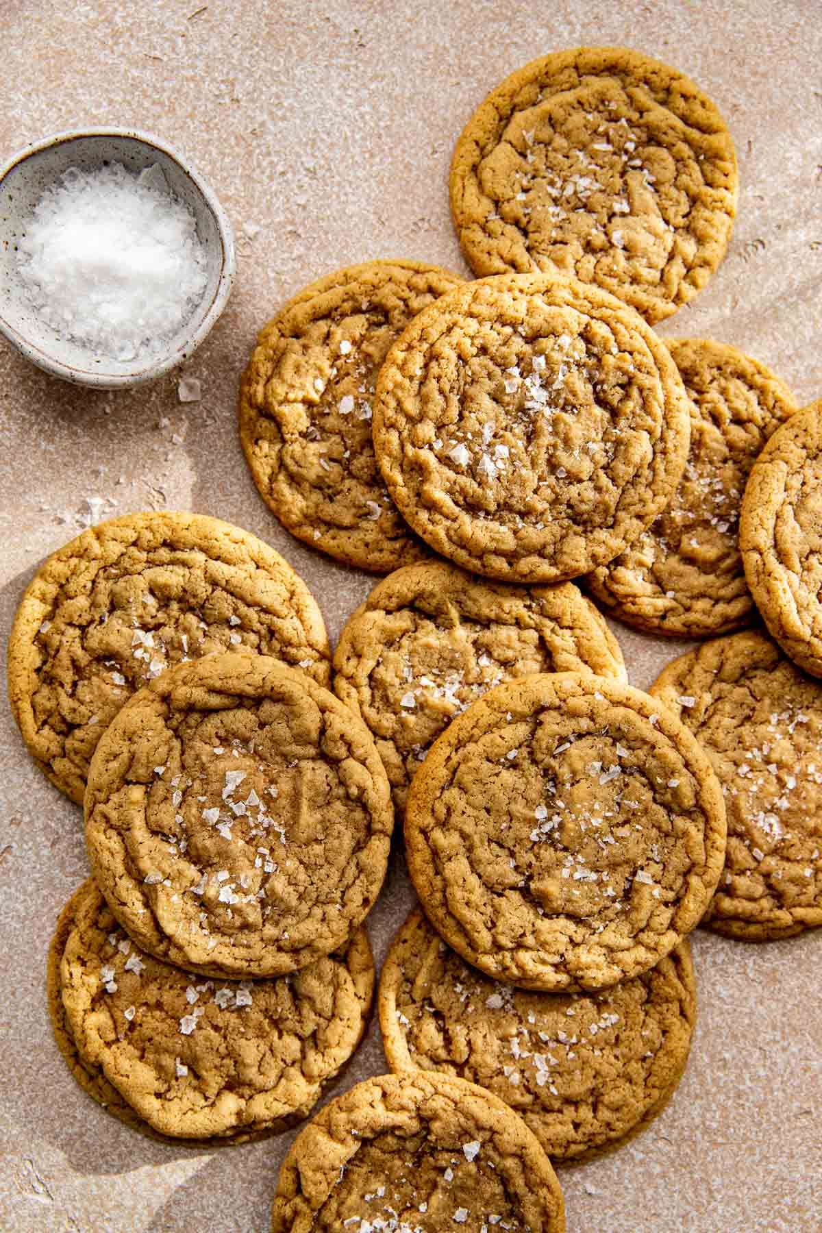 chocolate chipless cookies garnished with flaky sea salt on top. 