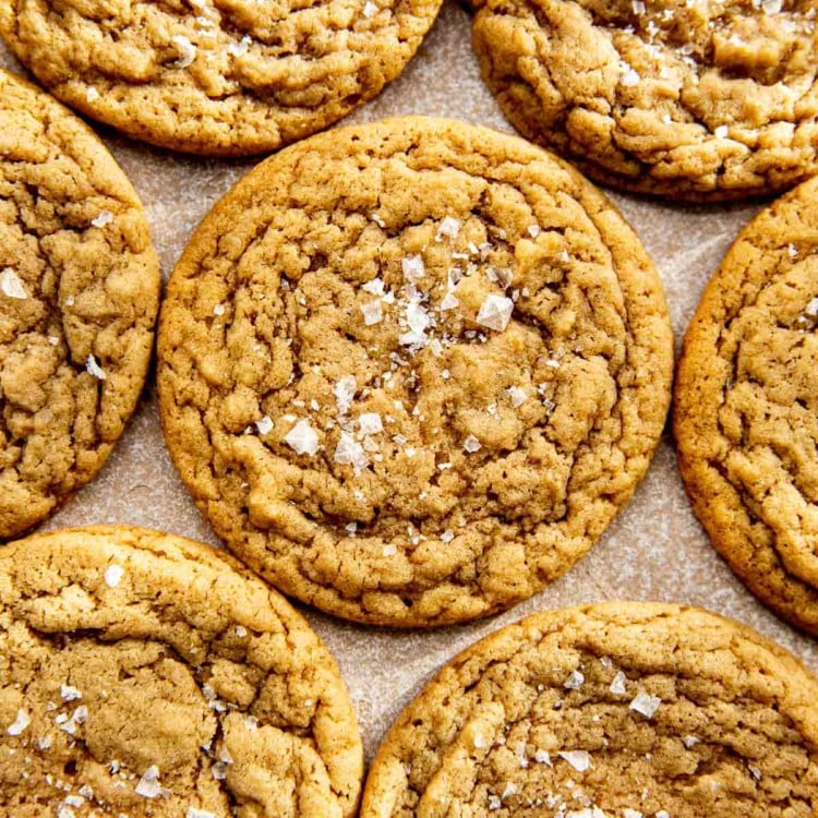 close up of chocolate chipless cookies sprinkled with flaky salt