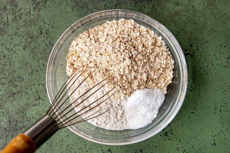 whisk with dry cookie ingredients in a clear bowl