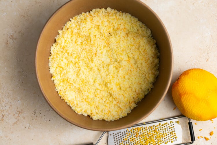 sugar mixture and orange zest in a bowl